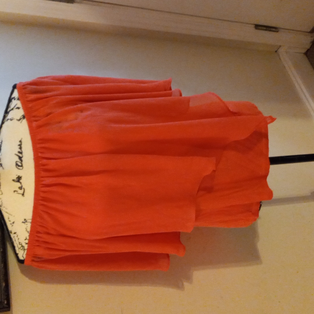 This beautiful melon colored top
